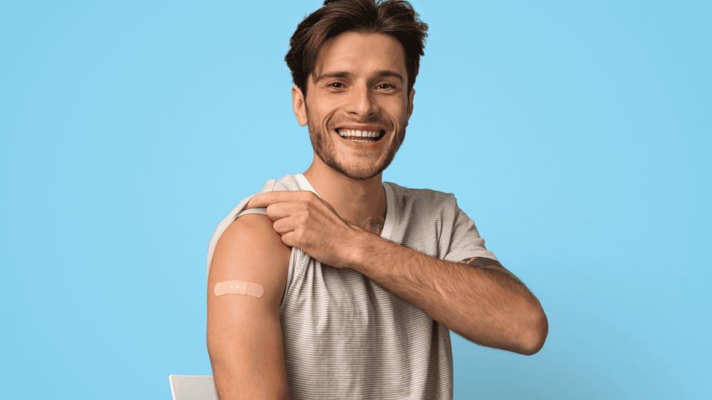 Person With Vaccine Bandaid