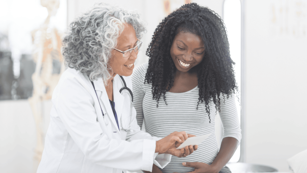 Pregnant Patient with Clinic Staff